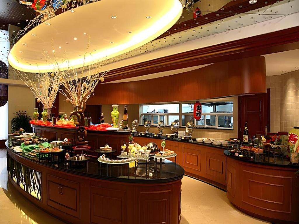 Grand Mercure Teda Dalian Esterno foto